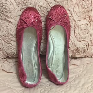 Adrienne Vittadini flats with stones.